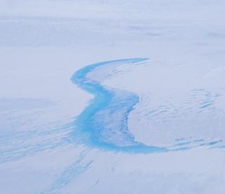Meltwater lake near Shackleton Ice Shelf, East Antarctica. (Photo: David Small, Durham University)