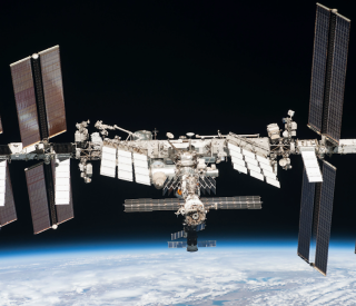  The International Space Station orbits Earth. NASA/Roscosmos