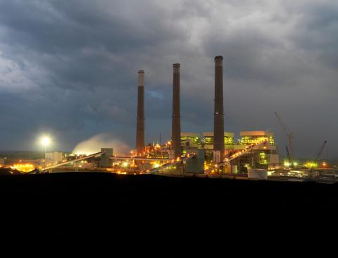 Coal-fired power plant by night